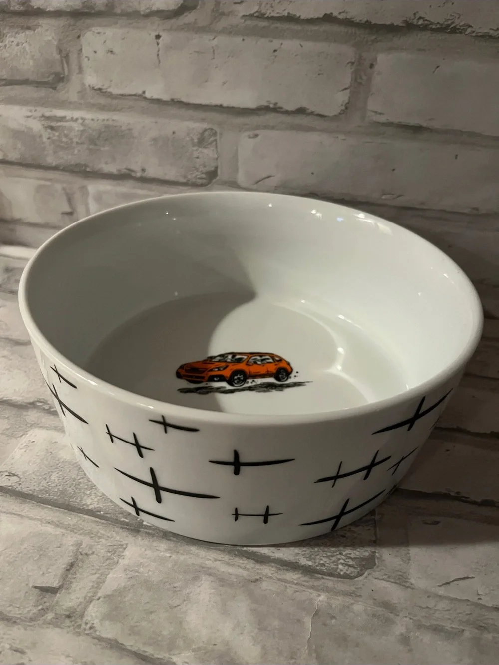 White Ceramic dog dish Bowl with Orange Car Accent and dogs